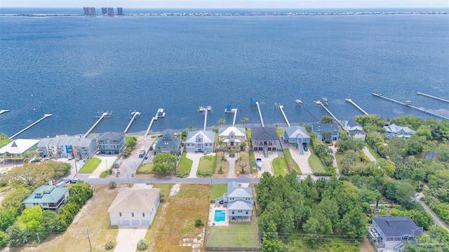 aerial view featuring a water view and a residential view