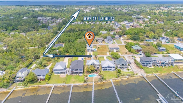 aerial view with a water view and a residential view