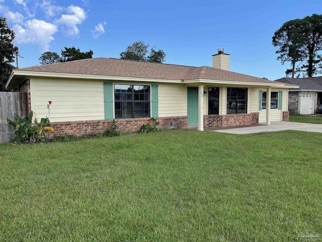 ranch-style home with a front yard