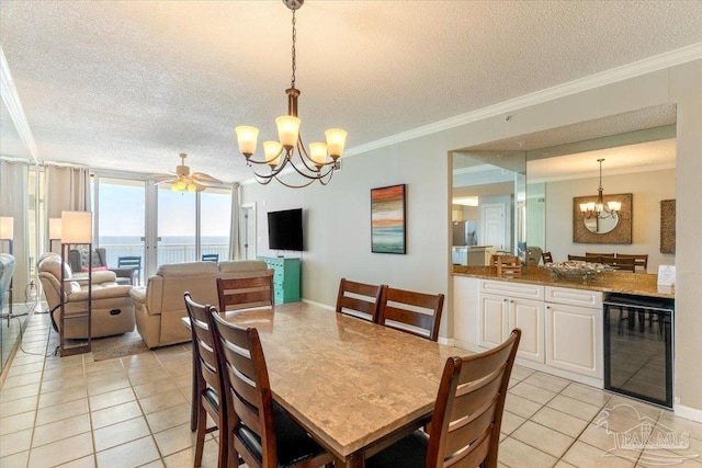 8499 Gulf Blvd Unit 1303, Navarre Beach, FL 32566 - dining space with a chandelier, wine cooler, a textured ceiling, light tile patterned floors, and ornamental molding
