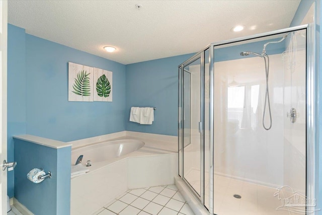 8499 Gulf Blvd Unit 1303, Navarre Beach, FL 32566 - bathroom featuring a stall shower, a bath, and a textured ceiling