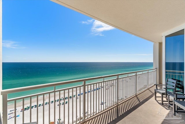 8499 Gulf Blvd Unit 1303, Navarre Beach, FL 32566 - balcony featuring view of water and beach