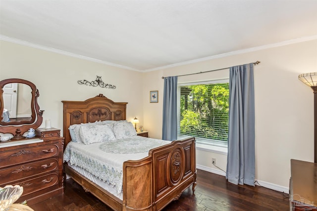 bedroom featuring crown molding and dark hardwood / wood-style floors