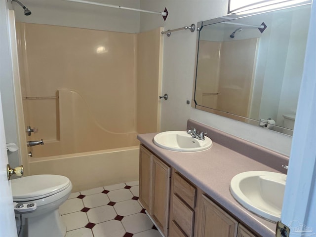 full bathroom featuring shower / bath combination, toilet, tile patterned floors, and double sink vanity