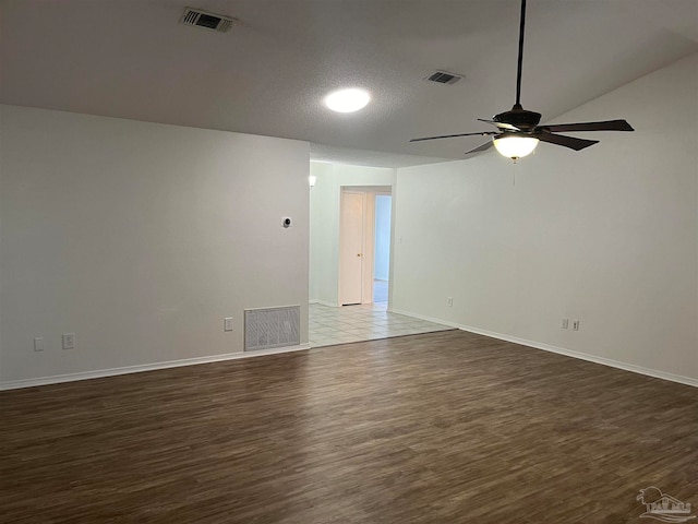 unfurnished room with wood-type flooring and ceiling fan