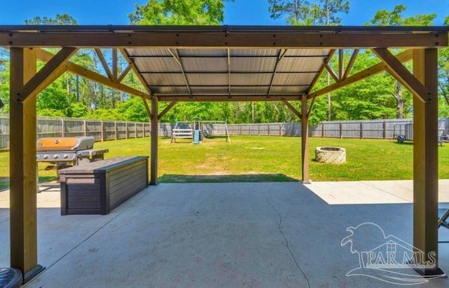 1516 Cadence Loop, Cantonment, FL 32533 - view of patio featuring area for grilling, a playground, and a gazebo