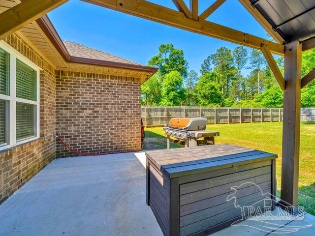 1516 Cadence Loop, Cantonment, FL 32533 - view of patio / terrace with a grill