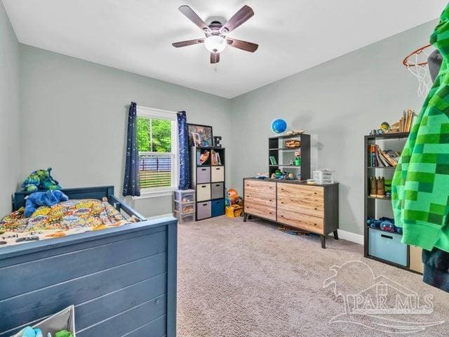 1516 Cadence Loop, Cantonment, FL 32533 - bedroom featuring carpet flooring, ceiling fan, and baseboards