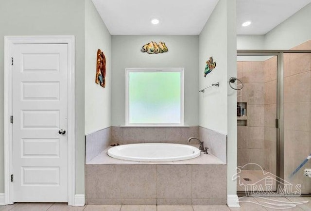1516 Cadence Loop, Cantonment, FL 32533 - full bath featuring a bath, a stall shower, and tile patterned floors