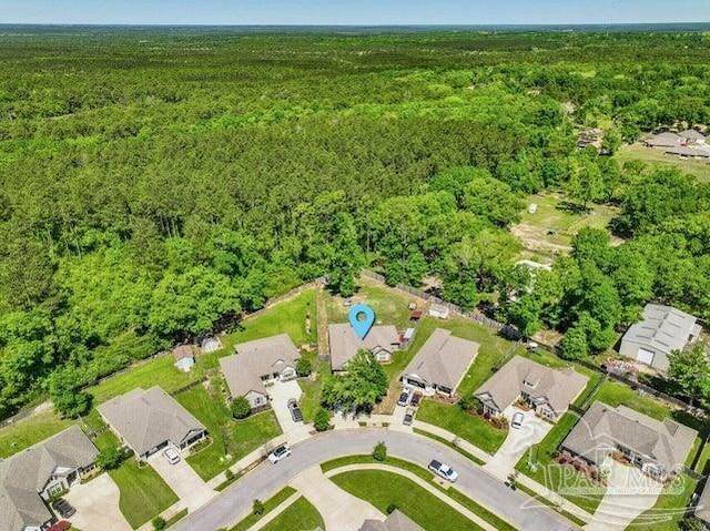 1516 Cadence Loop, Cantonment, FL 32533 - aerial overview of property's location with a heavily wooded area and nearby suburban area