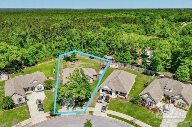1516 Cadence Loop, Cantonment, FL 32533 - aerial view of residential area with a heavily wooded area and property parcel outlined