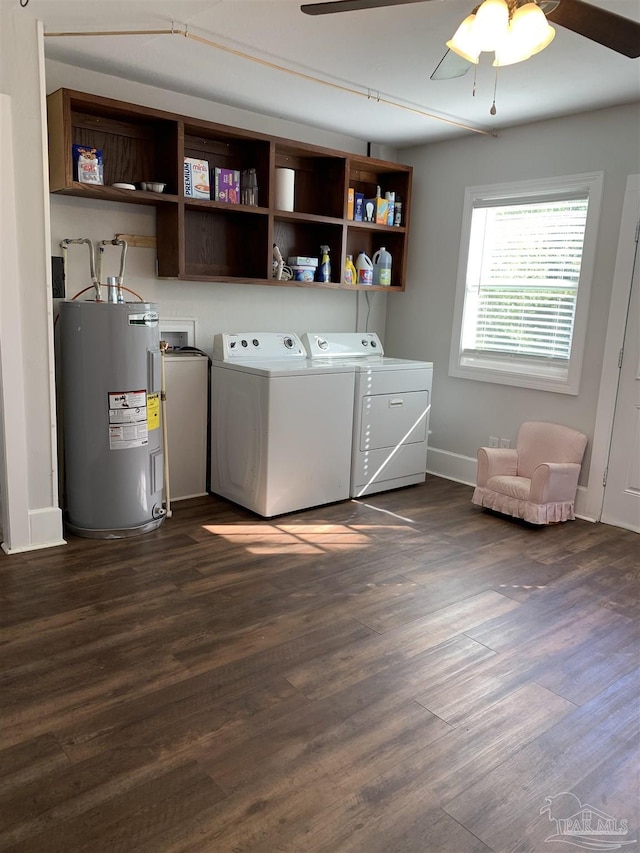 laundry room featuring separate washer and dryer, electric water heater, ceiling fan, and dark wood-type flooring