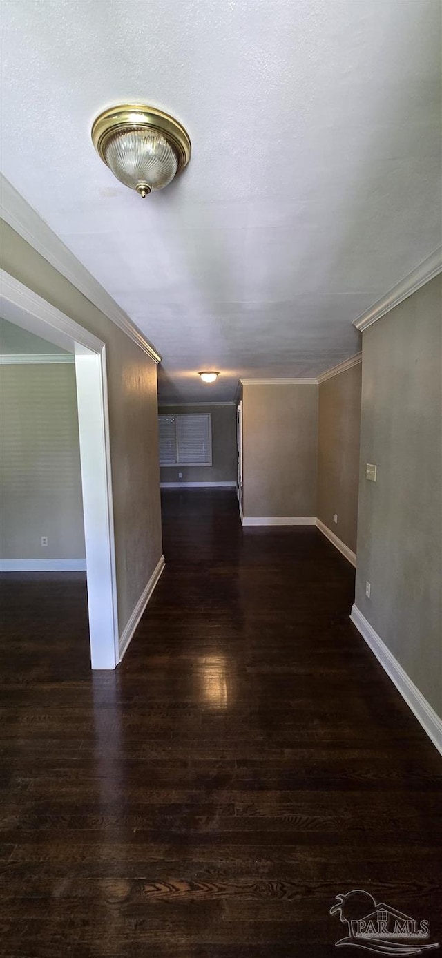381 Euclid St, Pensacola, FL 32503 - unfurnished room with dark wood-style flooring and ornamental molding
