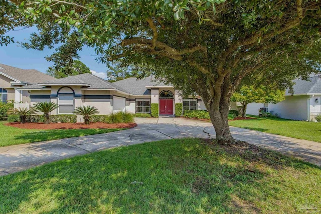 view of front of home with a front lawn