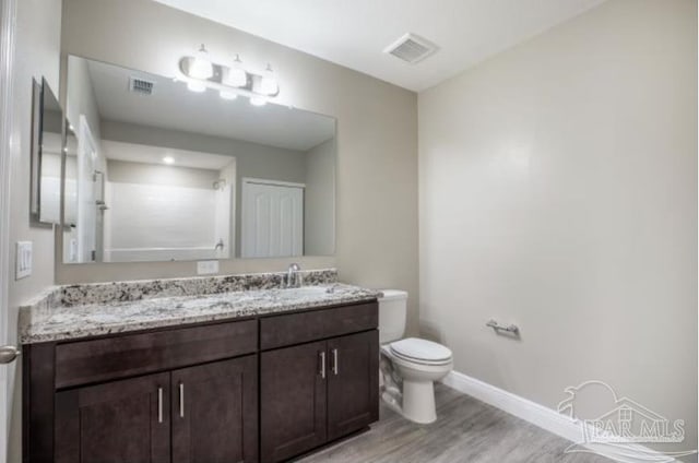 5752 Farrel Way, Milton, FL 32583 - bathroom with vanity and wood finished floors