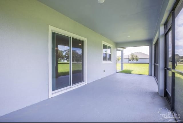 5752 Farrel Way, Milton, FL 32583 - unfurnished sunroom with carpet and plenty of natural light