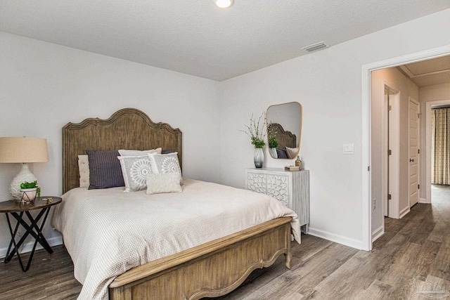 bedroom featuring hardwood / wood-style floors