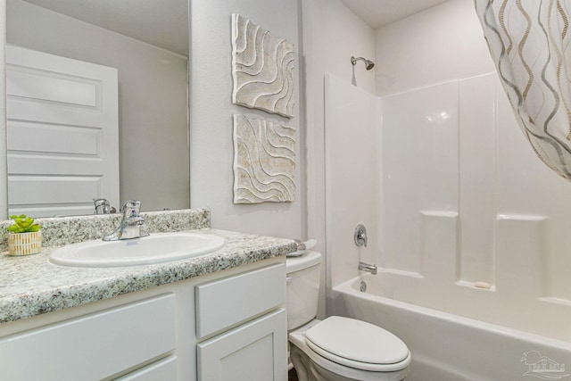 full bathroom with shower / bath combination, vanity, and toilet