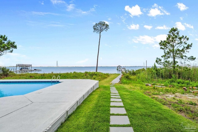 458 Parish Blvd, Mary Esther, FL 32569 - swimming pool with a water view and a lawn