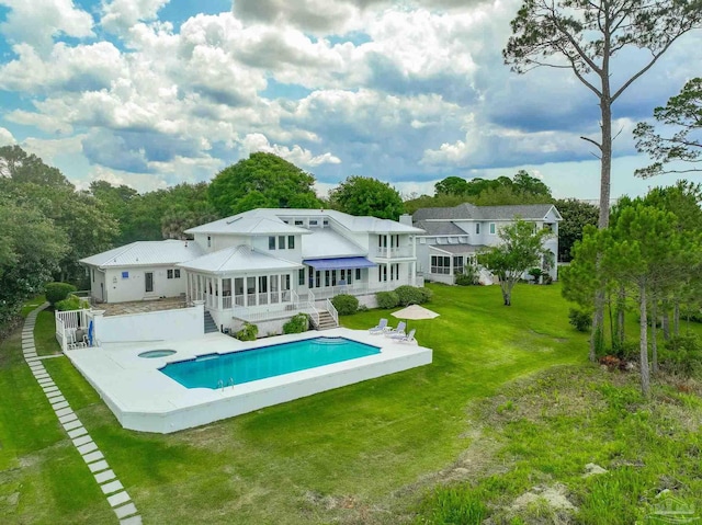 458 Parish Blvd, Mary Esther, FL 32569 - back of house featuring a sunroom, stairway, an outdoor pool, a lawn, and a wooden deck