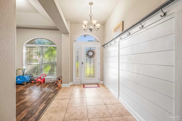 interior space with light hardwood / wood-style flooring and a chandelier