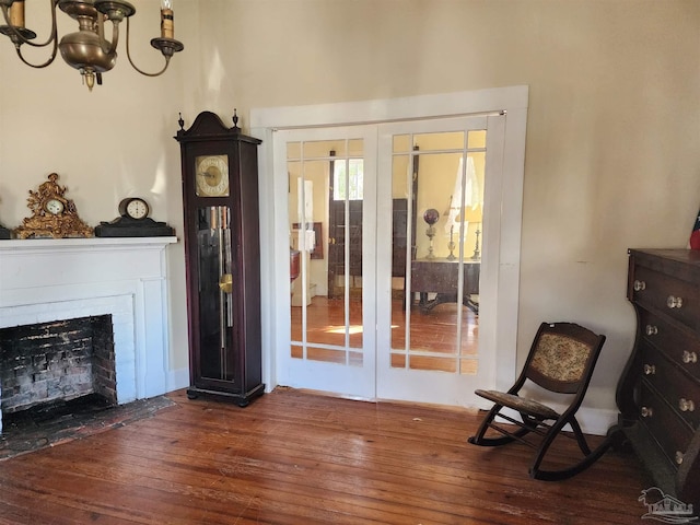 interior space with dark hardwood / wood-style floors and a chandelier