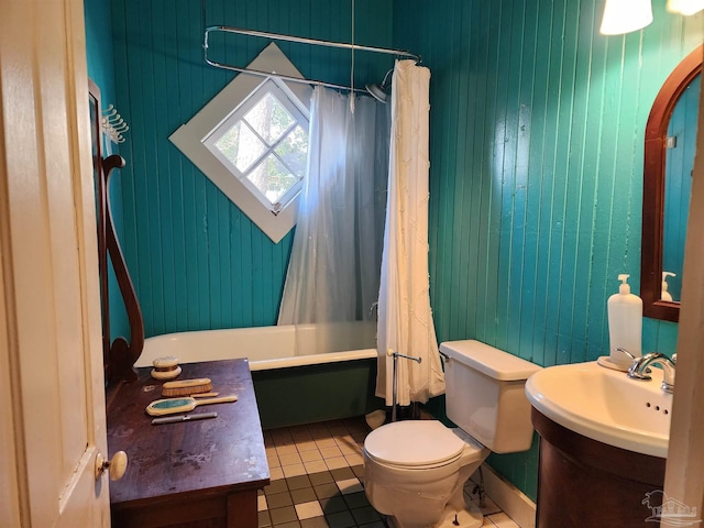 full bathroom featuring shower / bath combination with curtain, tile patterned floors, vanity, and toilet