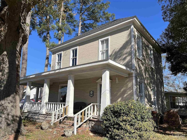 farmhouse with covered porch