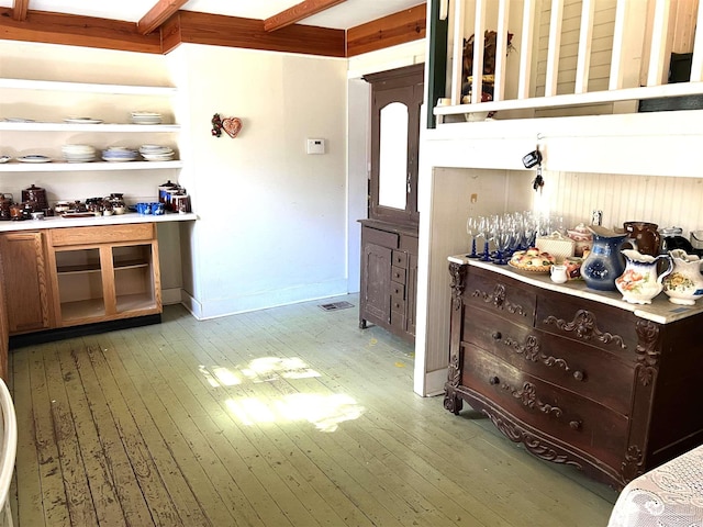 interior space with hardwood / wood-style floors