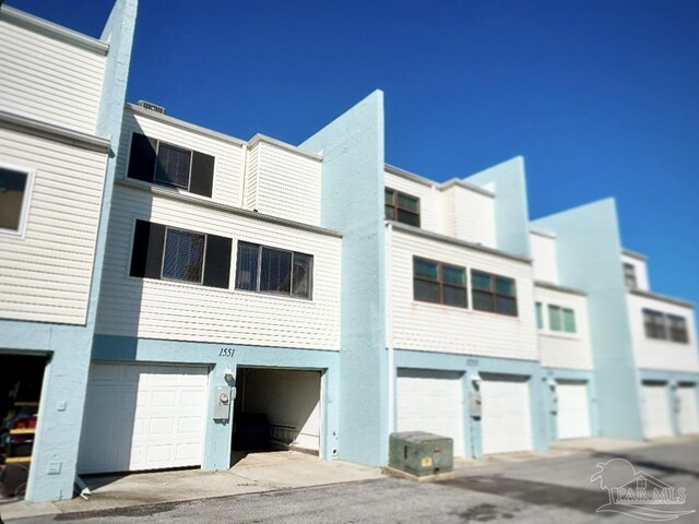 view of building exterior with a garage