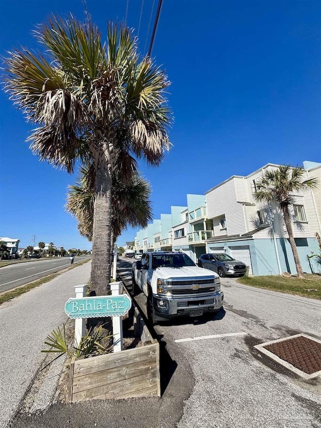 view of road with a residential view
