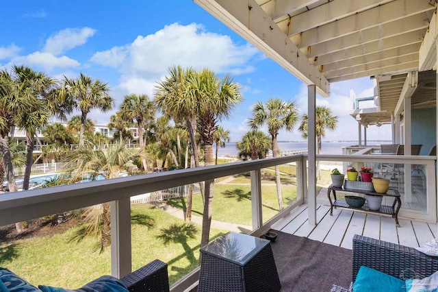 balcony featuring a water view