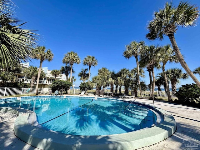 community pool with fence