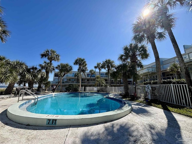 pool featuring fence