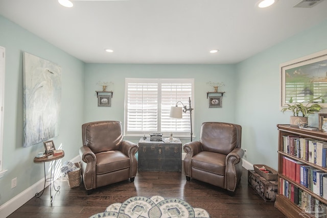 sitting room with dark hardwood / wood-style floors