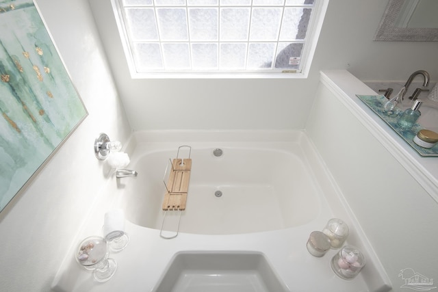 bathroom featuring a bath