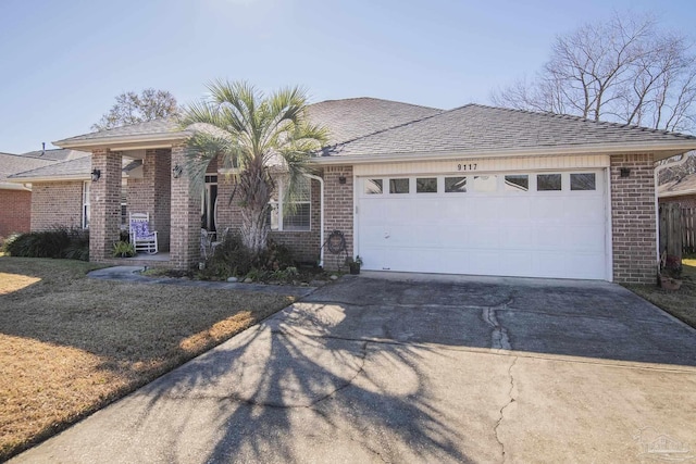 ranch-style house featuring a garage