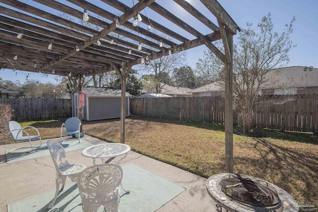 view of patio / terrace featuring a storage shed, a pergola, and a fire pit