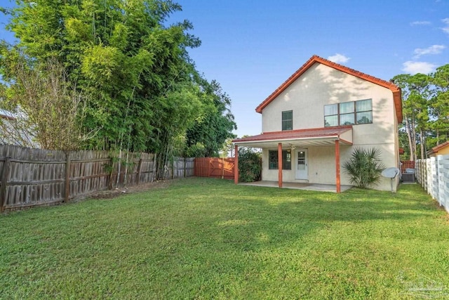 1841 E Smugglers Cove Dr, Gulf Breeze, FL 32563 - rear view of property featuring a patio area, stucco siding, and central AC unit