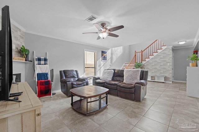 1841 E Smugglers Cove Dr, Gulf Breeze, FL 32563 - living area with crown molding, stairway, a ceiling fan, light tile patterned flooring, and baseboards