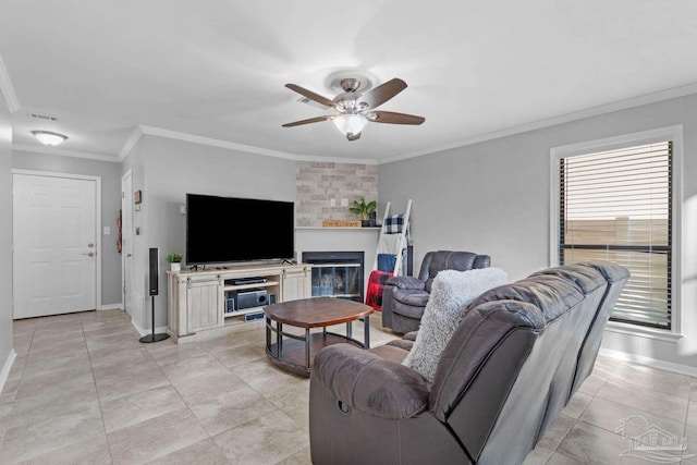 1841 E Smugglers Cove Dr, Gulf Breeze, FL 32563 - living area featuring baseboards, ceiling fan, crown molding, light tile patterned floors, and a fireplace