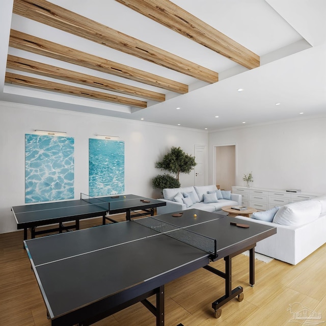 playroom with recessed lighting, beamed ceiling, ornamental molding, and wood finished floors