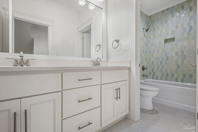 full bathroom with tiled shower / bath, toilet, ornamental molding, vanity, and tile patterned floors