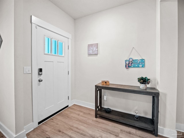 entrance foyer featuring light hardwood / wood-style floors