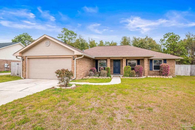 ranch-style home with an attached garage, fence, concrete driveway, and brick siding