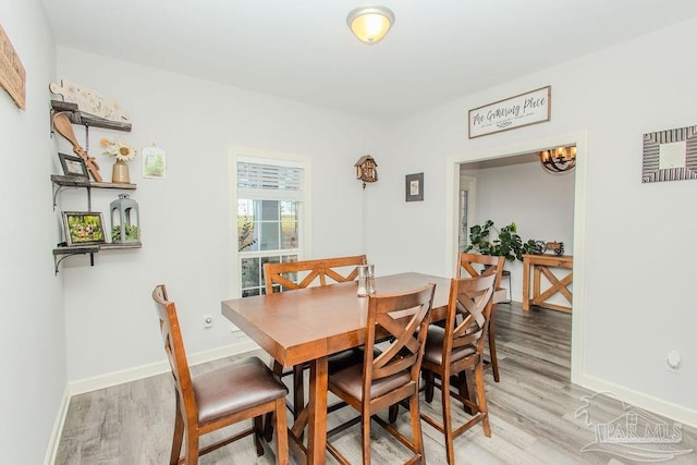 dining room featuring light wood-type flooring