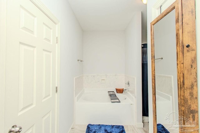 bathroom featuring a bathtub