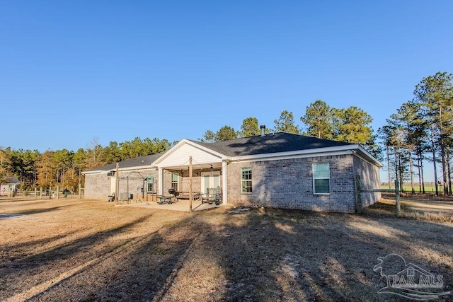 back of house featuring a patio area