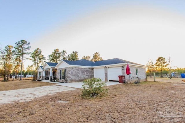 single story home featuring a garage