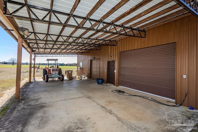 garage featuring a carport